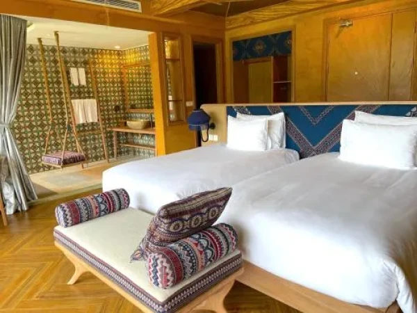 Ảnh chi tiết phòng Resort-Le-Champ-Tu-Le-phong-heritage-experience-2-giuong-don-vivatrip_03.webp