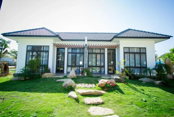Ảnh chi tiết phòng Thảo-Nguyên-Resort-Mộc-Châu-phong-deluxe-giuong-doi-vivatrip.webp