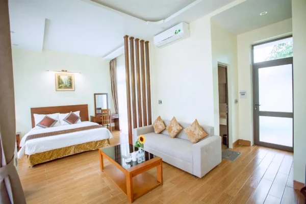 Ảnh chi tiết phòng Thảo-Nguyên-Resort-Mộc-Châu-phong-deluxe-giuong-doi-vivatrip_02.webp