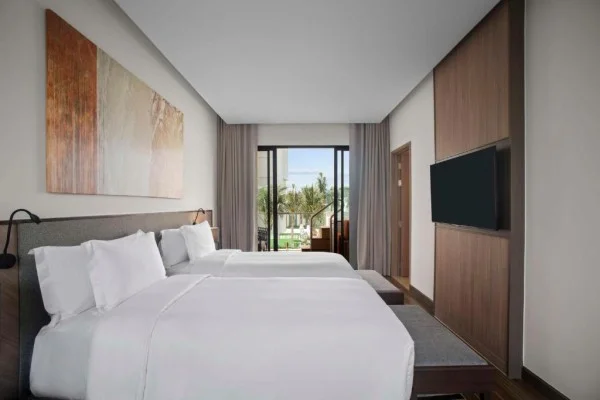 Ảnh chi tiết phòng Suite Giường Cỡ King/ 2 Giường Đơn Có Bể Jacuzzi Nhìn Ra Vườn 7