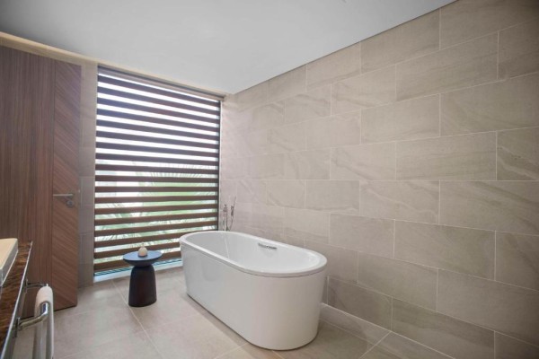 Ảnh chi tiết phòng angsana-ho-tram-suite-2-giuong-co-king-2-giuong-don-co-be-jacuzzi-nhin-ra-vuon-vivatrip.jpg