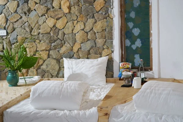 Ảnh chi tiết phòng bakhan-village-resort-mai-chau-dorm-room-vivatrip-03.webp