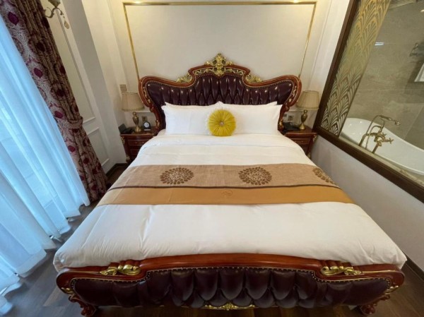 Ảnh chi tiết phòng camellia-luxury-hotel-tam-dao-phong-co-ban-cong-vivatrip-02.jpg