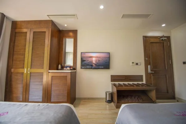 Ảnh chi tiết phòng cat-ba-paradise-hotel-sky-bar-massage-phong-2-giuong-don-vivatrip-04.webp