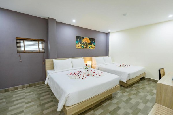 Ảnh chi tiết phòng cat-ba-violet-hotel-phong-3-nguoi-vivatrip-05.jpg