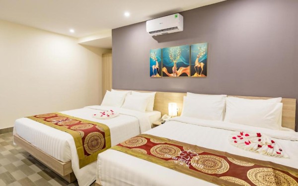 Ảnh chi tiết phòng cat-ba-violet-hotel-phong-4-nguoi-vivatrip.jpg