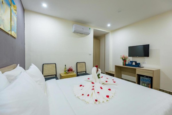 Ảnh chi tiết phòng cat-ba-violet-hotel-phong-giuong-doi-vivatrip.jpg