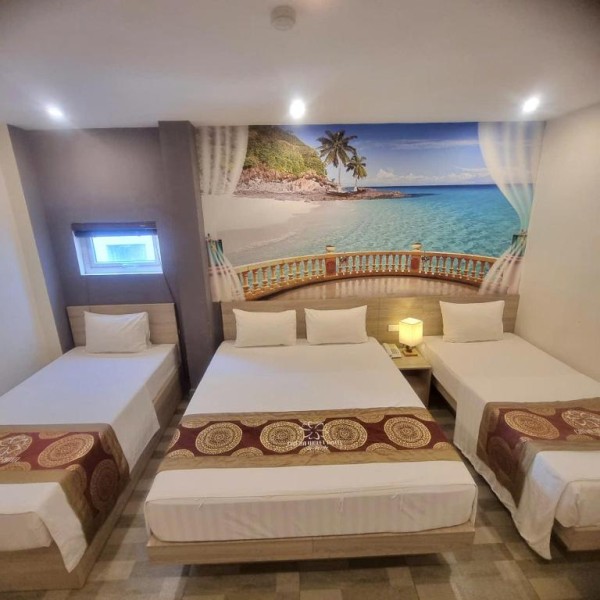 Ảnh chi tiết phòng cat-ba-violet-hotel-phong-ngu-tap-the-vivatrip-03.jpg