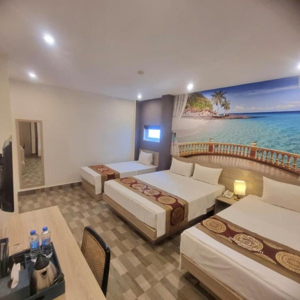 Ảnh chi tiết phòng cat-ba-violet-hotel-phong-ngu-tap-the-vivatrip-04.jpg