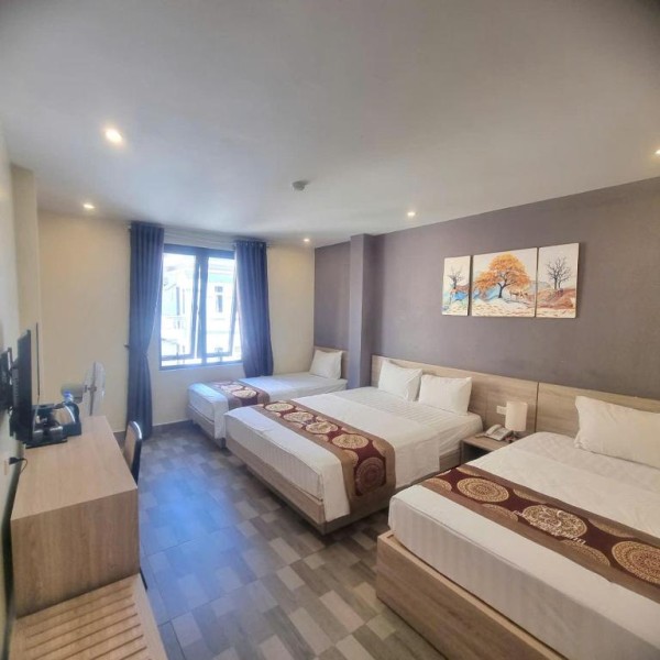 Ảnh chi tiết phòng cat-ba-violet-hotel-phong-ngu-tap-the-vivatrip-05.jpg