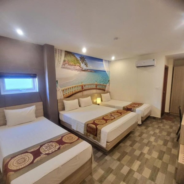 Ảnh chi tiết phòng cat-ba-violet-hotel-phong-ngu-tap-the-vivatrip.jpg