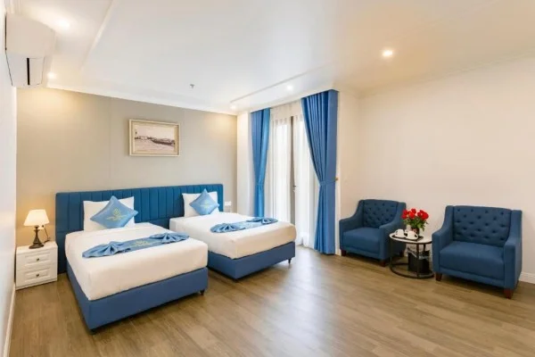 Ảnh chi tiết phòng cat-ba-wonder-hotel-suite-2-phong-ngu-vivatrip-03.webp