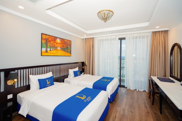 Ảnh chi tiết phòng dlioro-hotel-resort-senior-deluxe-twin-vivatrip-02.jpg