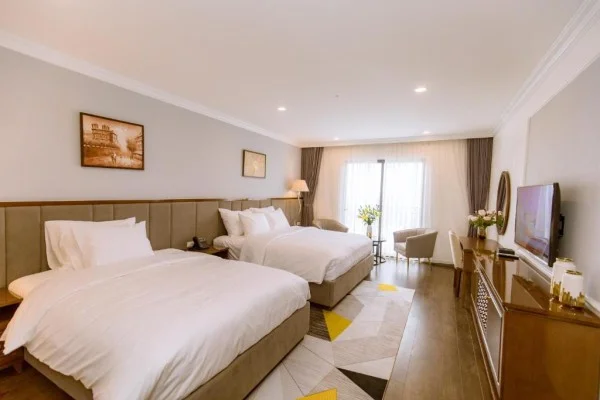 Ảnh chi tiết phòng glory-resort-son-tay-phong-deluxe-2-giuong-don-vivatrip-02.webp