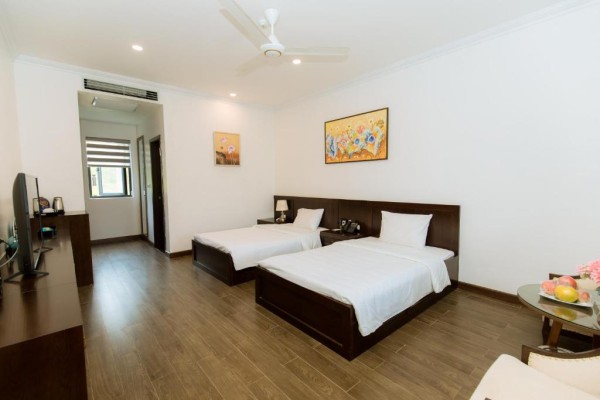 Ảnh chi tiết phòng glory-resort-son-tay-phong-tieu-chuan-2-giuong-don-vivatrip.jpg