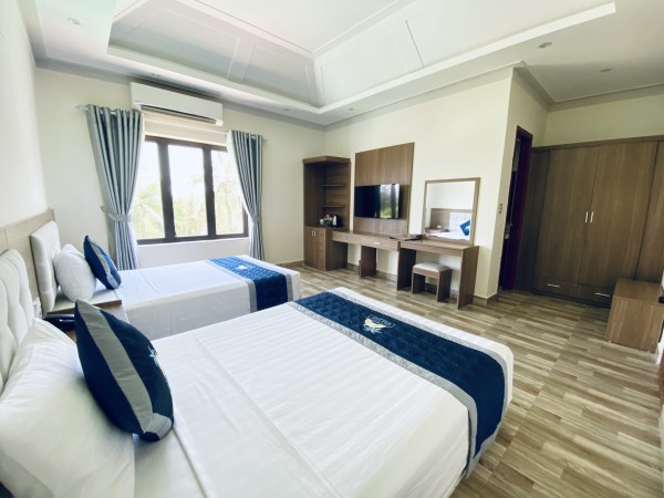 Ảnh chi tiết phòng holiday-hon-dau-resort-standard-twin-vivatrip-05.jpg