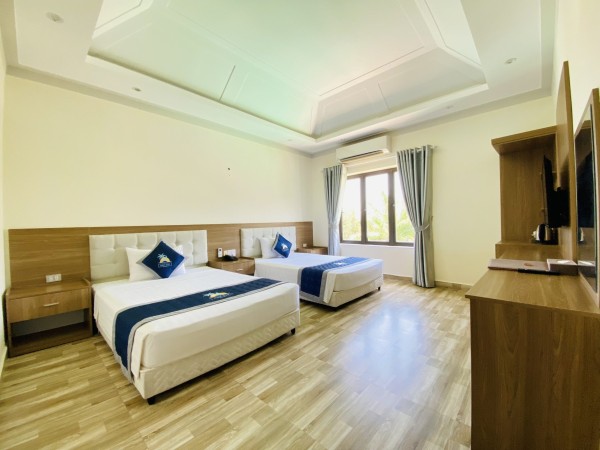 Ảnh chi tiết phòng holiday-hon-dau-resort-standard-twin-vivatrip-06.jpg