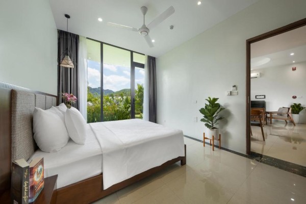 Ảnh chi tiết phòng ivory-villas-and-resort-phong-deluxe-co-giuong-co-king-vivatrip-03.jpg