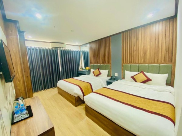 Ảnh chi tiết phòng khach-san-kien-ngoc-phong-deluxe-vivatrip-02.jpg