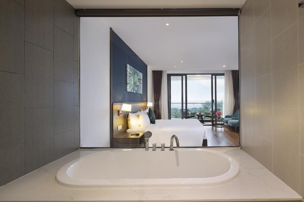 Ảnh chi tiết phòng le-palmier-ho-tram-resort-phong-delixe-2-giuong-don-vivatrip-03.jpg