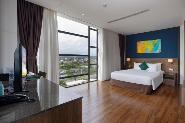 Ảnh chi tiết phòng le-palmier-ho-tram-resort-phong-superior-giuong-doi-vivatrip-02.jpg