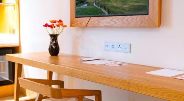 Ảnh chi tiết phòng Bungalow Premier Giường Đôi Có Ban Công Hướng Vườn (Bungalow Premier Double Garden View with Balcony) 12