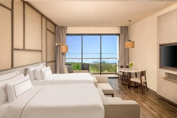 Ảnh chi tiết phòng melia-ho-tram-beach-resort-deluxe-giuong-doi-2-giuong-don-co-ban-cong-vivatrip-02.webp