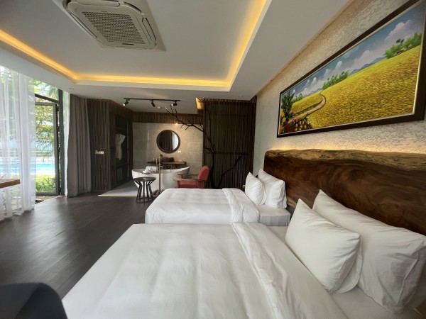 Ảnh chi tiết phòng minawa-kenhga-resort-spa-ninh-binh-phong-deluxe-giuong-doi-2-giuong-don-nhin-ra-vuon-vivatrip-04.jpg