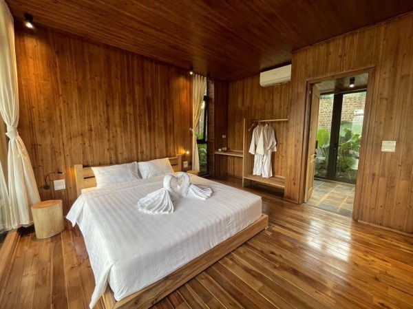 Ảnh chi tiết phòng mo-village-nha-mit-tang-1-deluxe-room-vivatrip-04.jpg