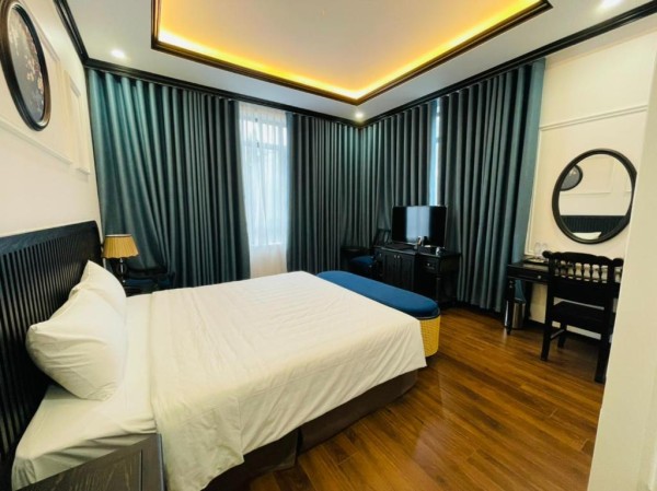 Ảnh chi tiết phòng moma-paris-hotel-ninh-binh-phong-deluxe-vivatrip-04.jpg