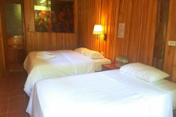 Ảnh chi tiết phòng monkey-island-resort-phong-2-giuong-don-nhin-ra-khu-vuon-vivatrip.webp