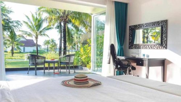 Ảnh chi tiết phòng robinson-nam-hoi-an-deuxe-double-or-twin-room-with-garden-vivatrip-05.jpg