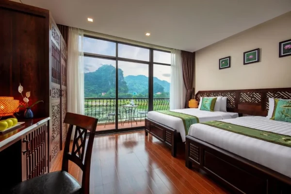 Ảnh chi tiết phòng tam-coc-la-montagne-resort-spa-ninh-binh-phong-deluxe-nhin-ra-ho-nuoc-vivatrip-1.webp